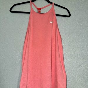 Brand is Nike. It is a athletic shirt. Size small.